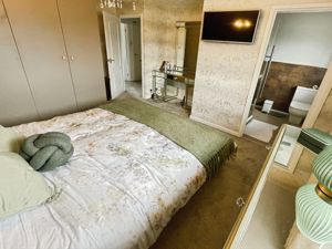 Bedroom One- click for photo gallery